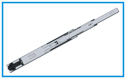 Medium duty drawer slide with spring self-closing device